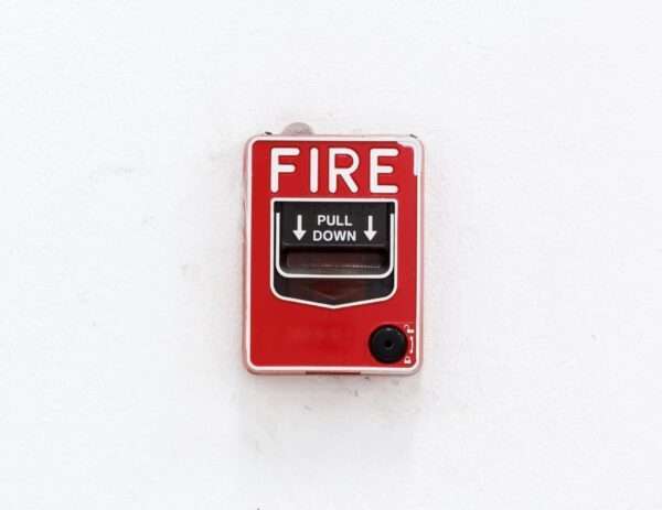 red pull-down fire alarm