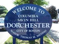 Welcome sign for Dorchester, MA, featuring Columbia and Savin Hill neighborhoods.